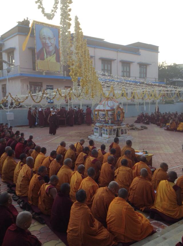 Kyabje Khensur Kangyurwa Rinpoche's portrait displayed above monks gathered for his memorial rites